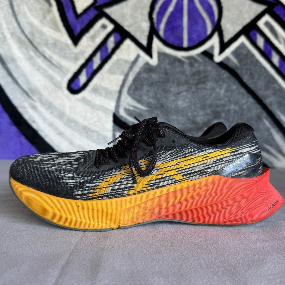 Size 10.5 - ASICS Novablast 3 Running Shoes Black Orange 1011B458